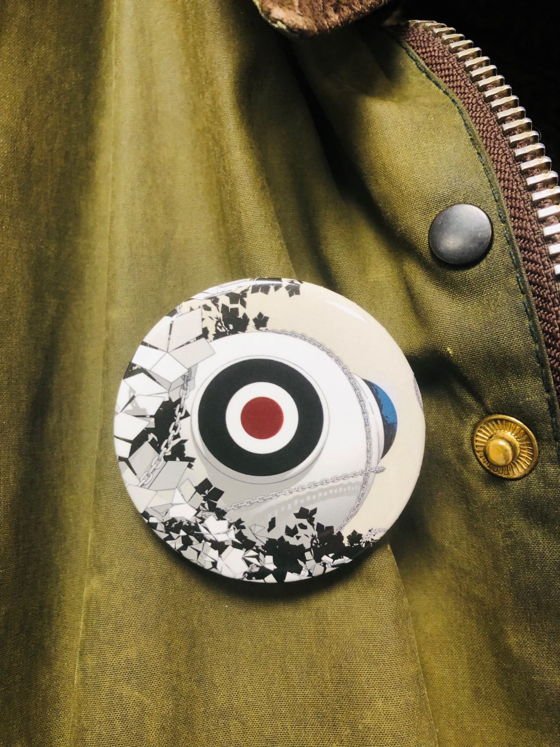 Bilde av en kulturnatt-button på en jakke. 